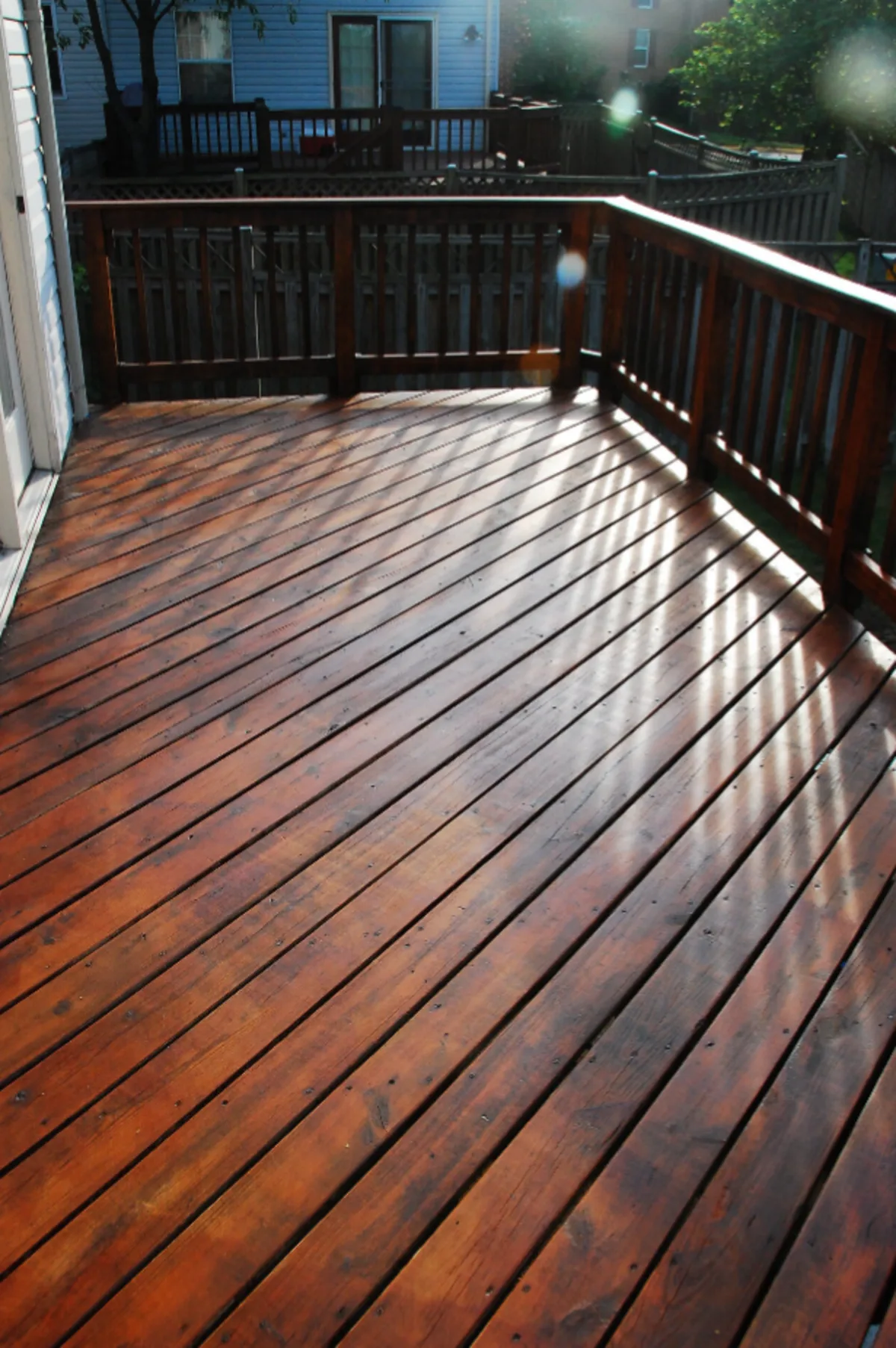 Freshly stained wooden deck with railings in St. Thomas, Ontario