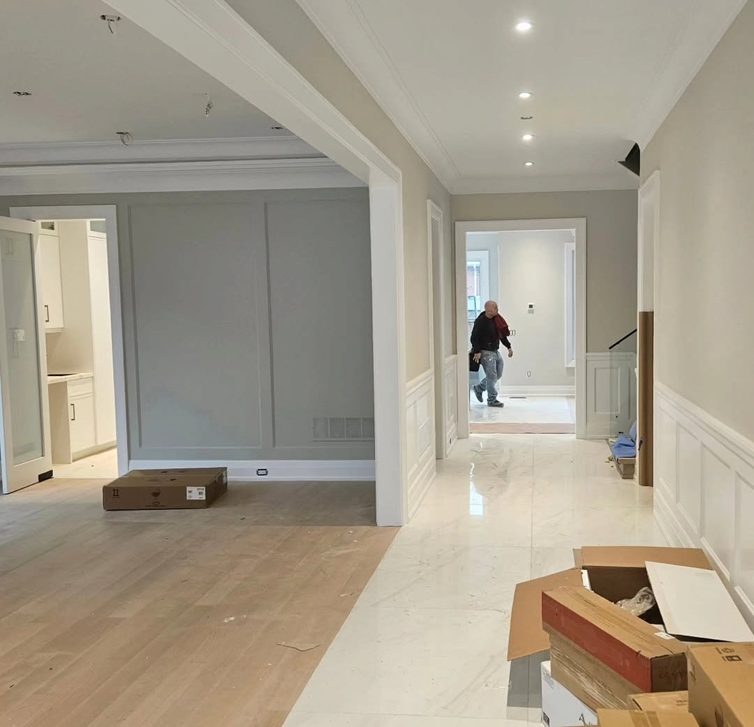 Painted hallway with wainscoting and crown moulding